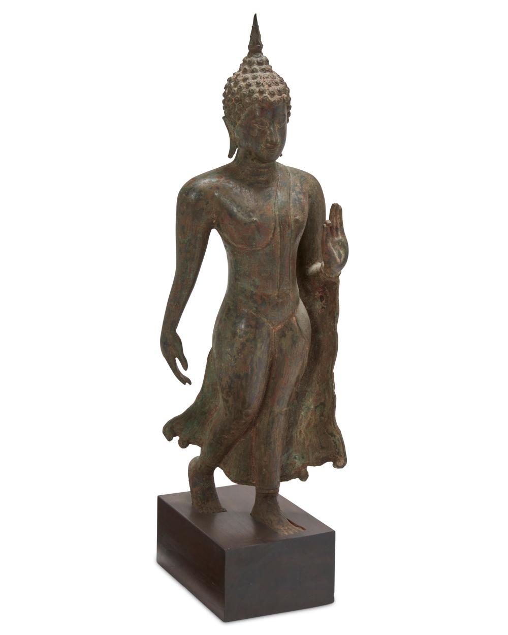 A SUKHOTHAI-STYLE WALKING BUDDHA