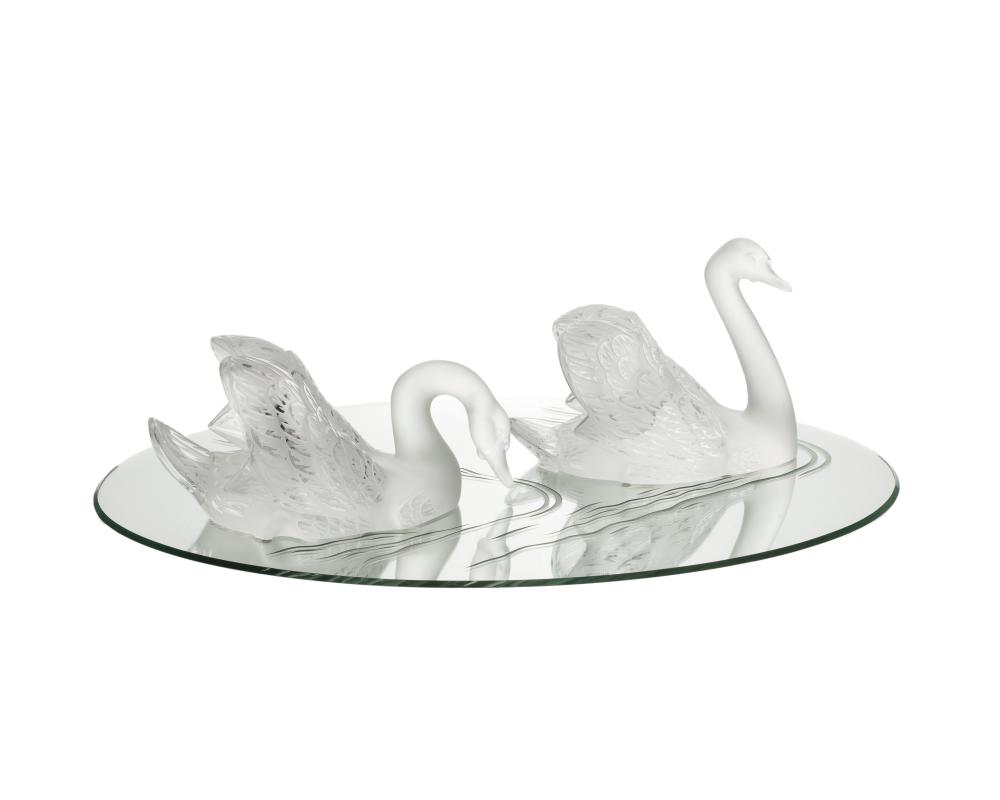 A PAIR OF LALIQUE GLASS SWANS ON