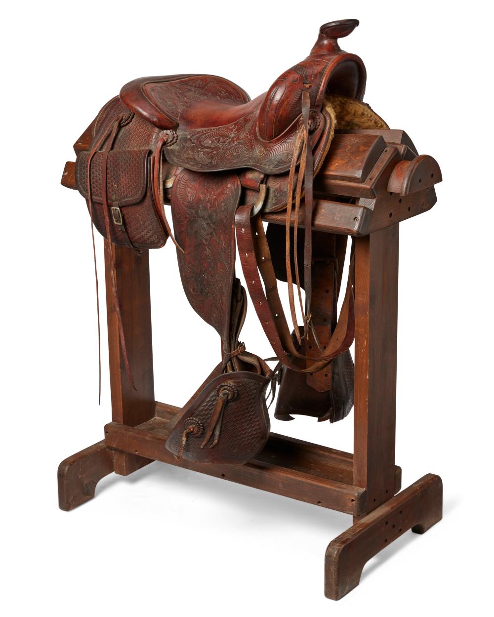 A TOOLED LEATHER WESTERN RANCH SADDLEA