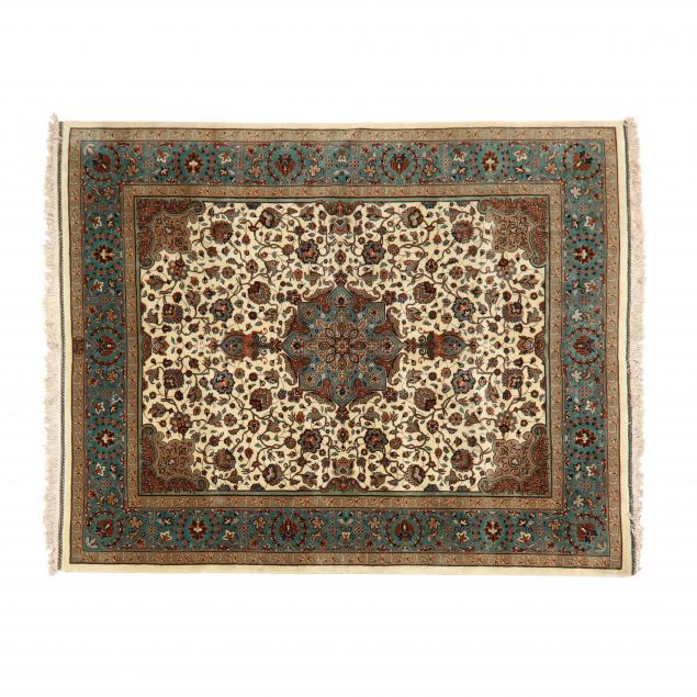 TABRIZ RUG The ivory field with