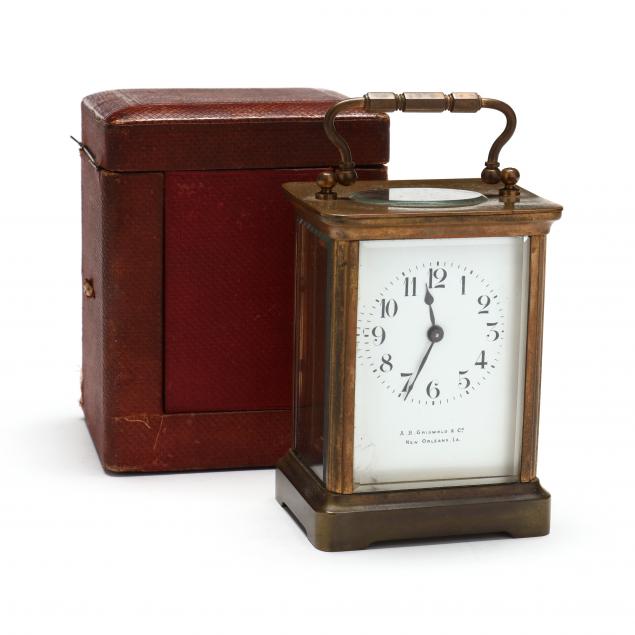 A FRENCH BRASS CARRIAGE CLOCK WITH