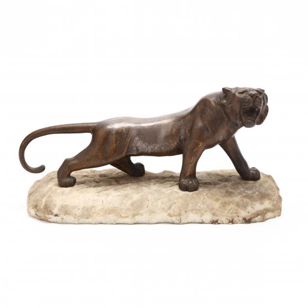 SCULPTURE OF A STRIDING TIGER, SIGNED