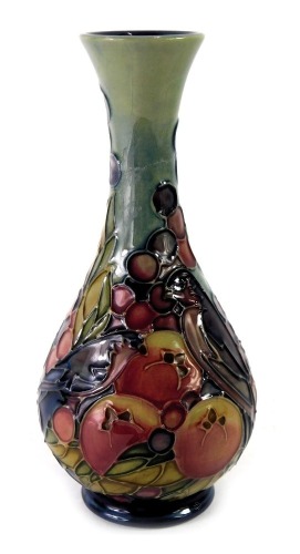 A William Moorcroft bud vase, on