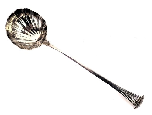 An 18thC silver serving ladle, with