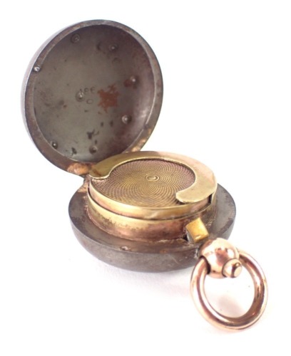 A steel sovereign case, with brass