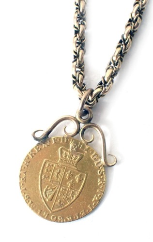 A George I gold guinea pendant,