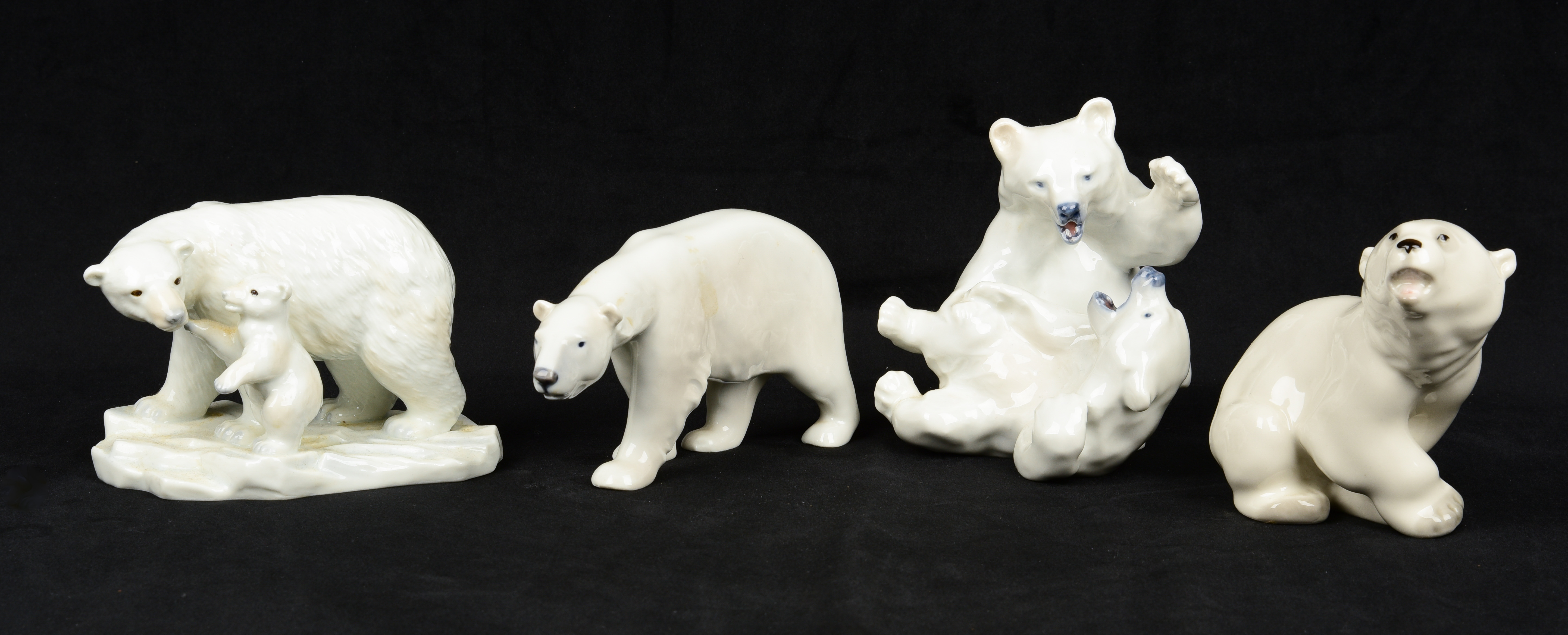  4 Porcelain polar bear figurines  3b1037