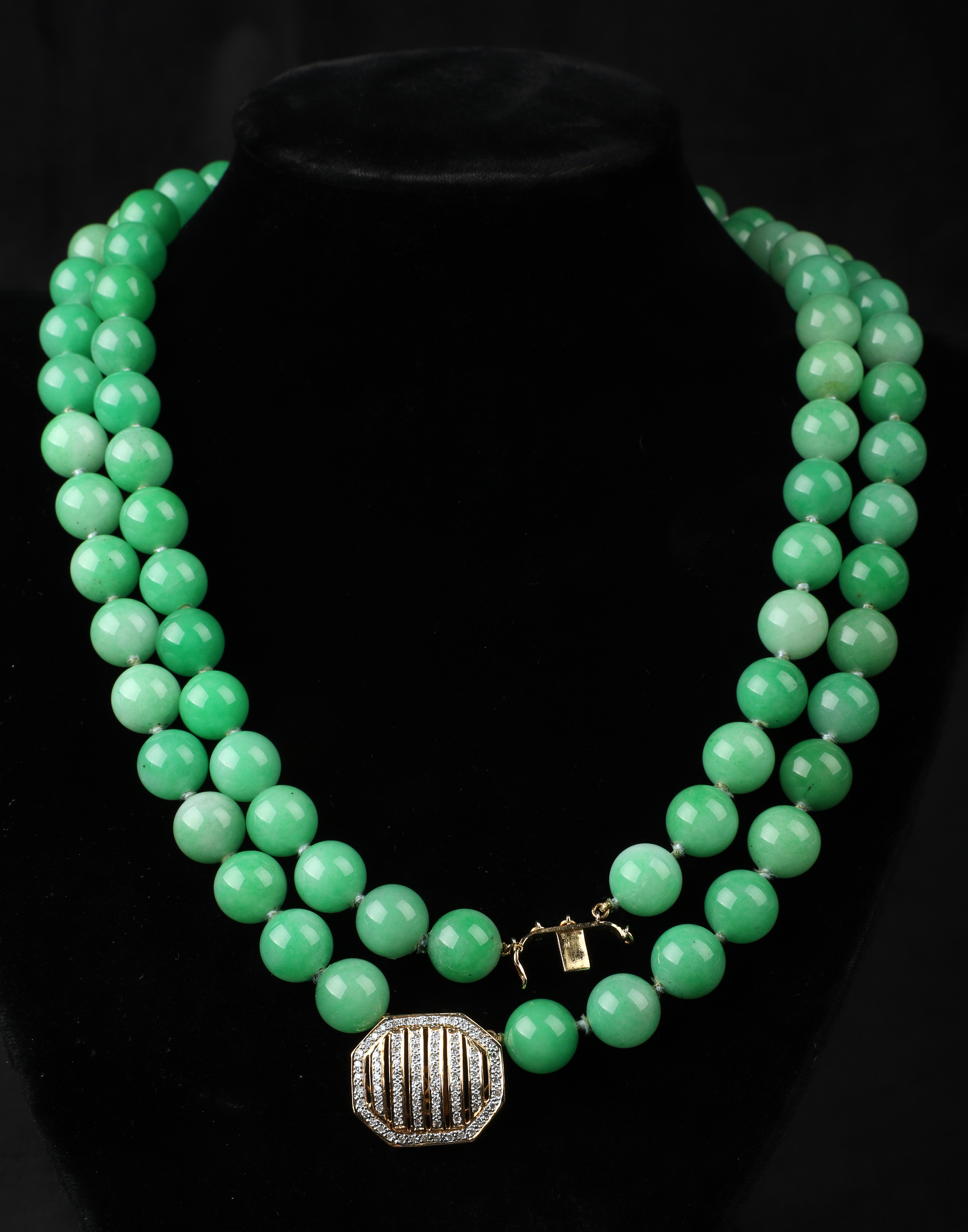 A gold, jade and diamond pave necklace,