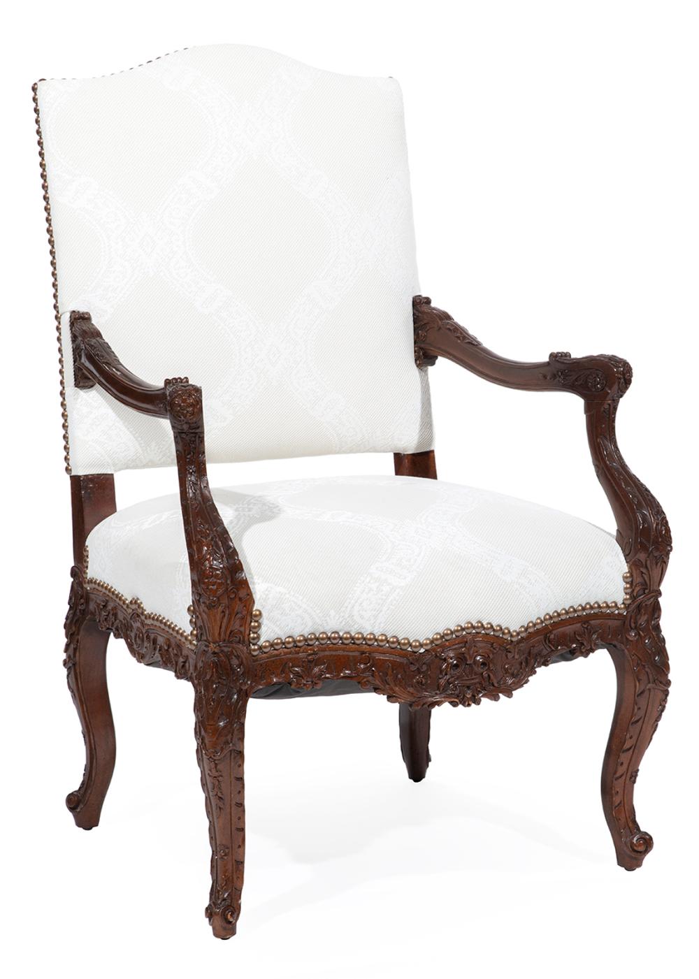 REGENCE-STYLE CARVED WALNUT FAUTEUIL