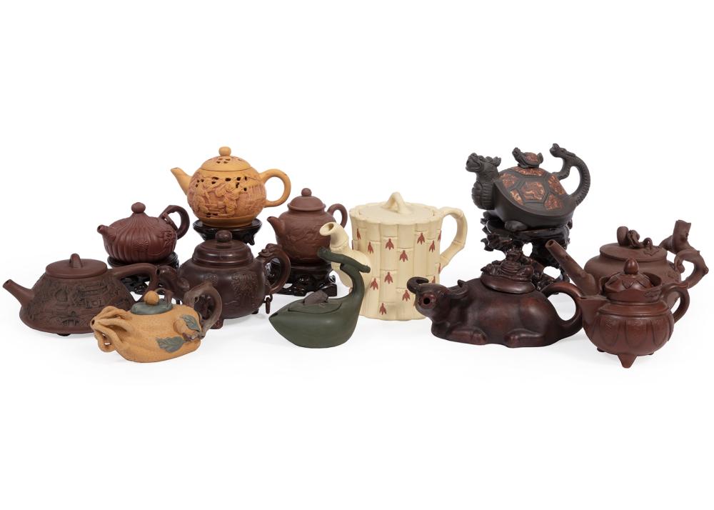 ELEVEN CHINESE YIXING POTTERY TEAPOTSCollection
