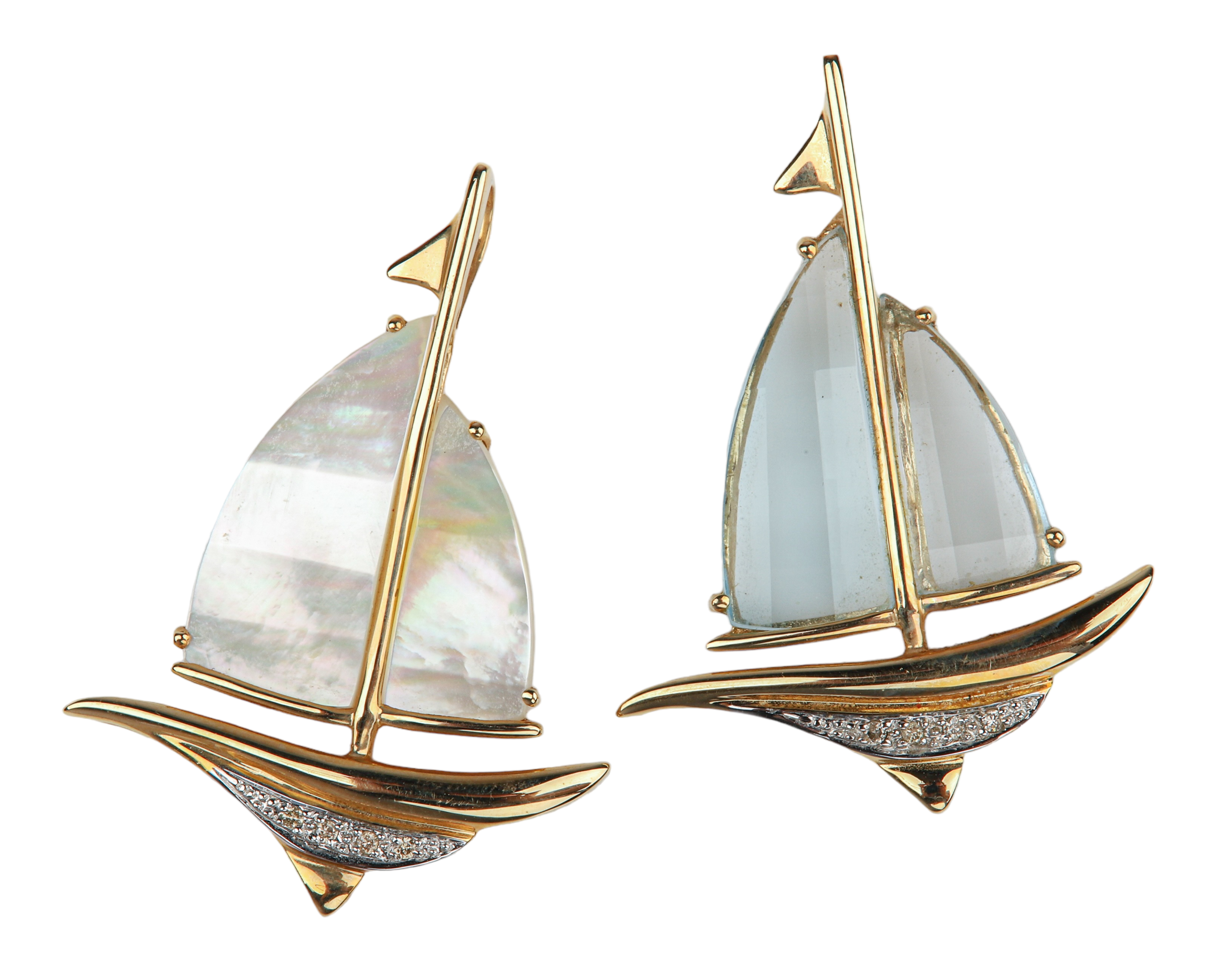 (2) 14K yellow gold sailboat pendants,