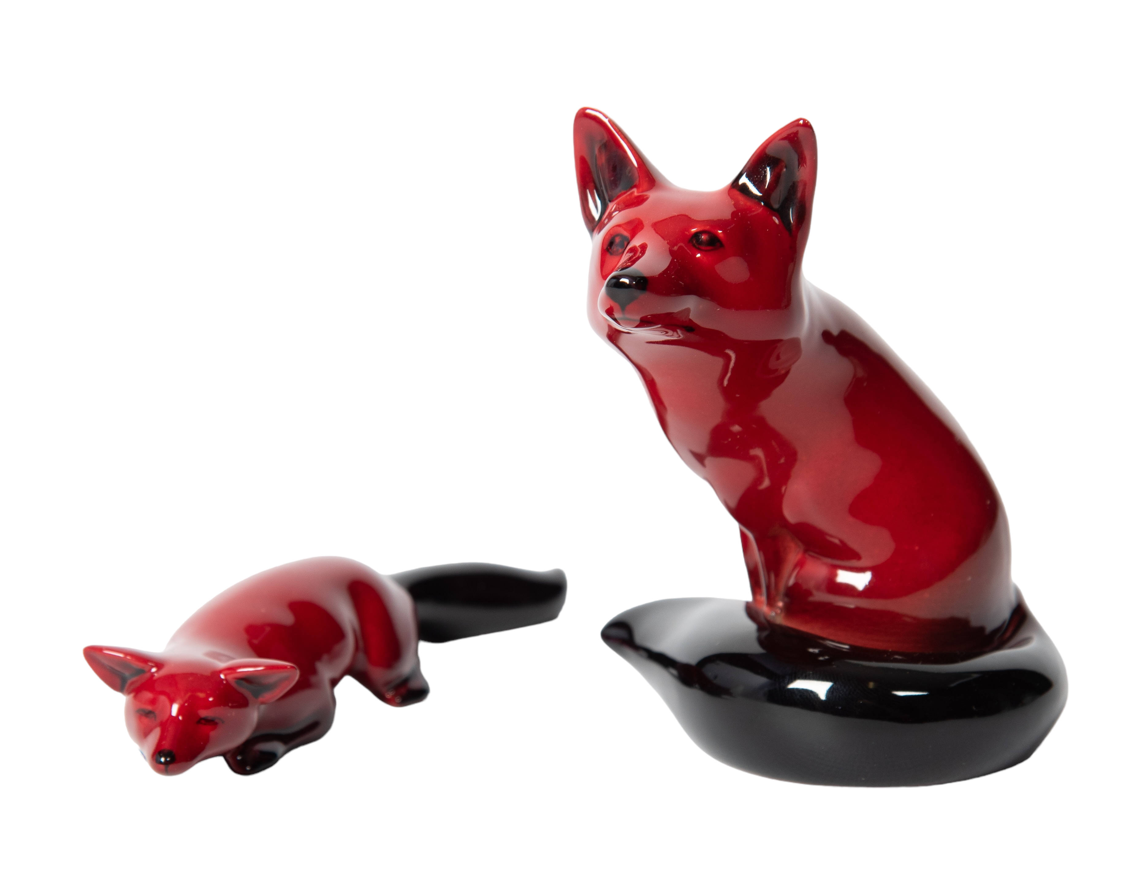  2 Royal Doulton Flambe fox figurines  3b1971