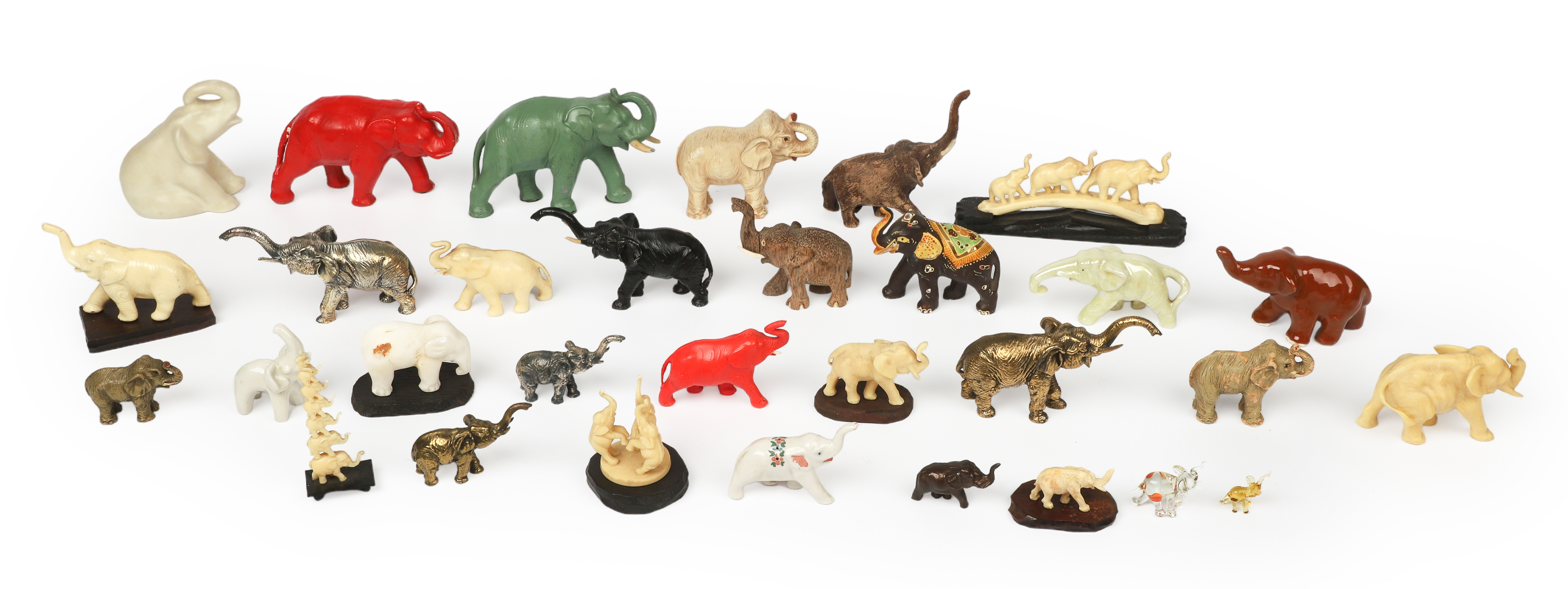 Large lot of elephant figurines, including