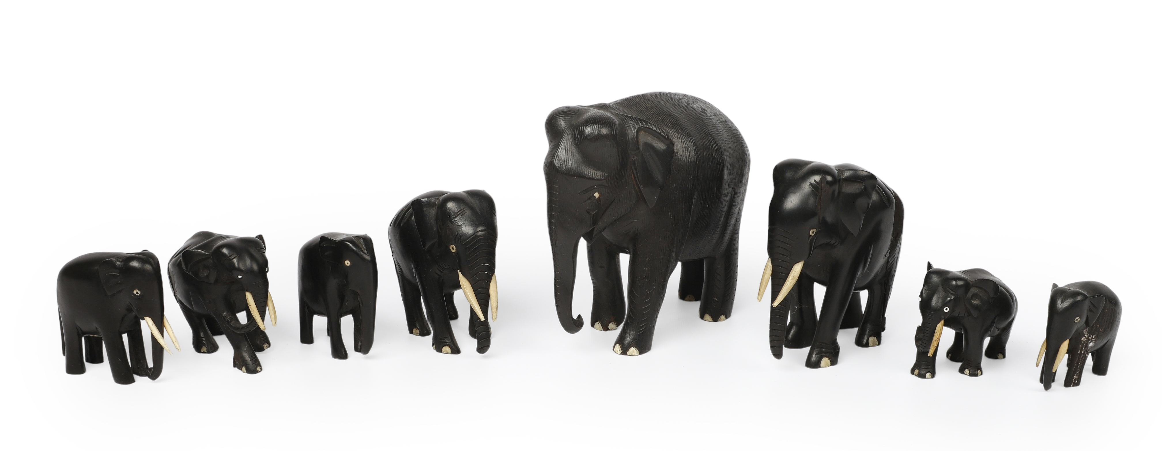 (8) Ebony elephant figurines, bone
