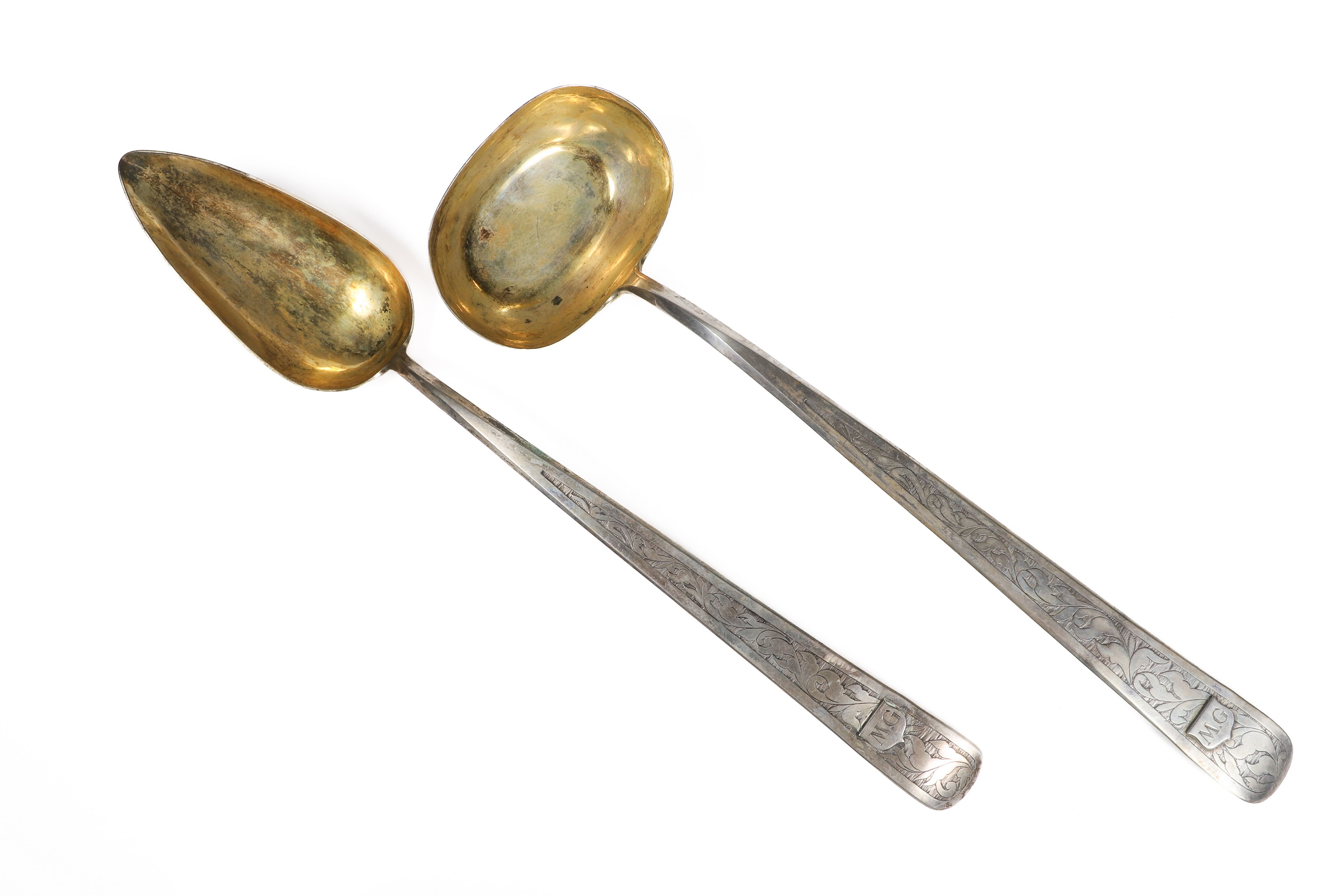 Silver soup ladle and stuffing spoon,