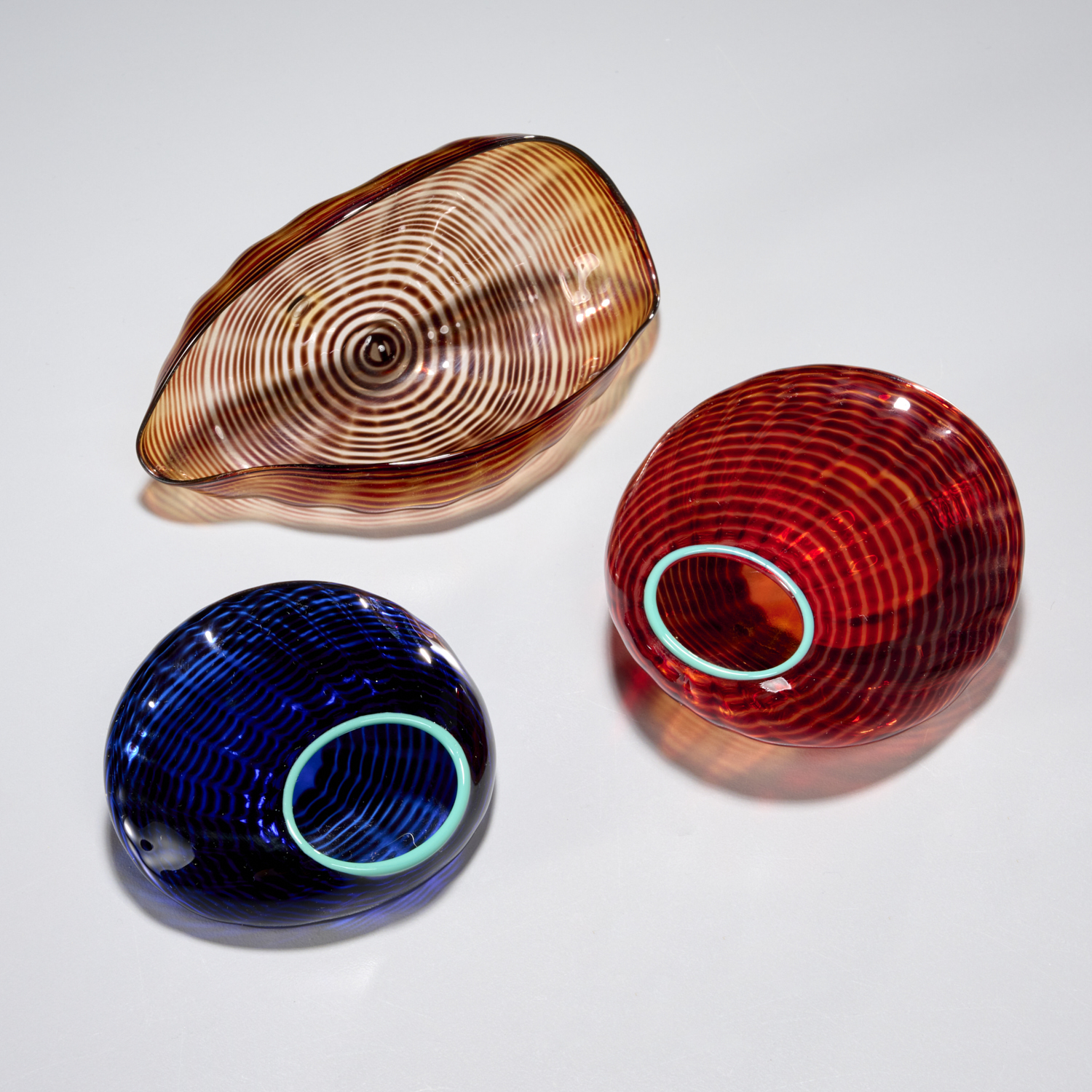 DALE CHIHULY, (3) SMALL GLASS VESSEL