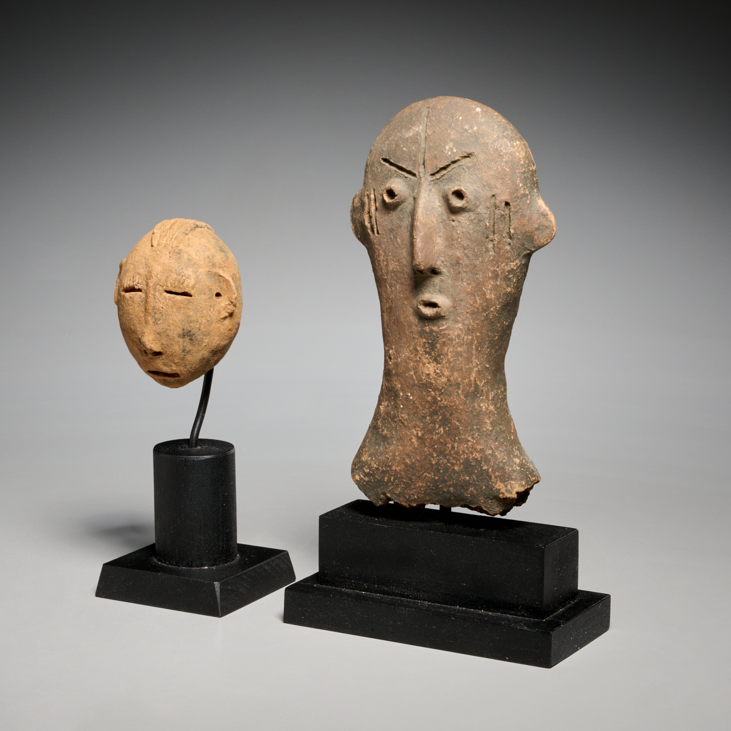 (2) BURA FIRED CLAY HEADS Possibly