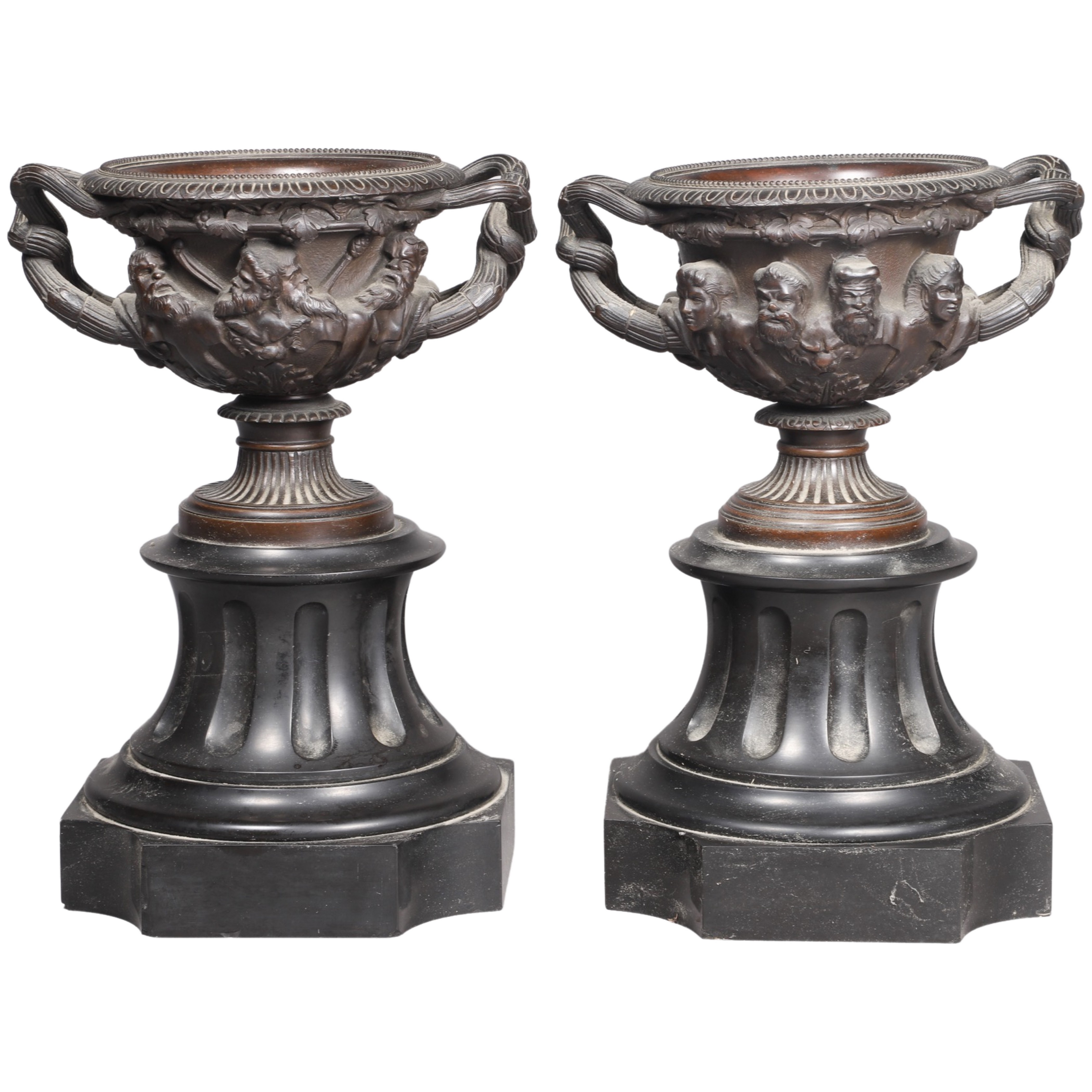 Pair of Warwick style bronze urns on