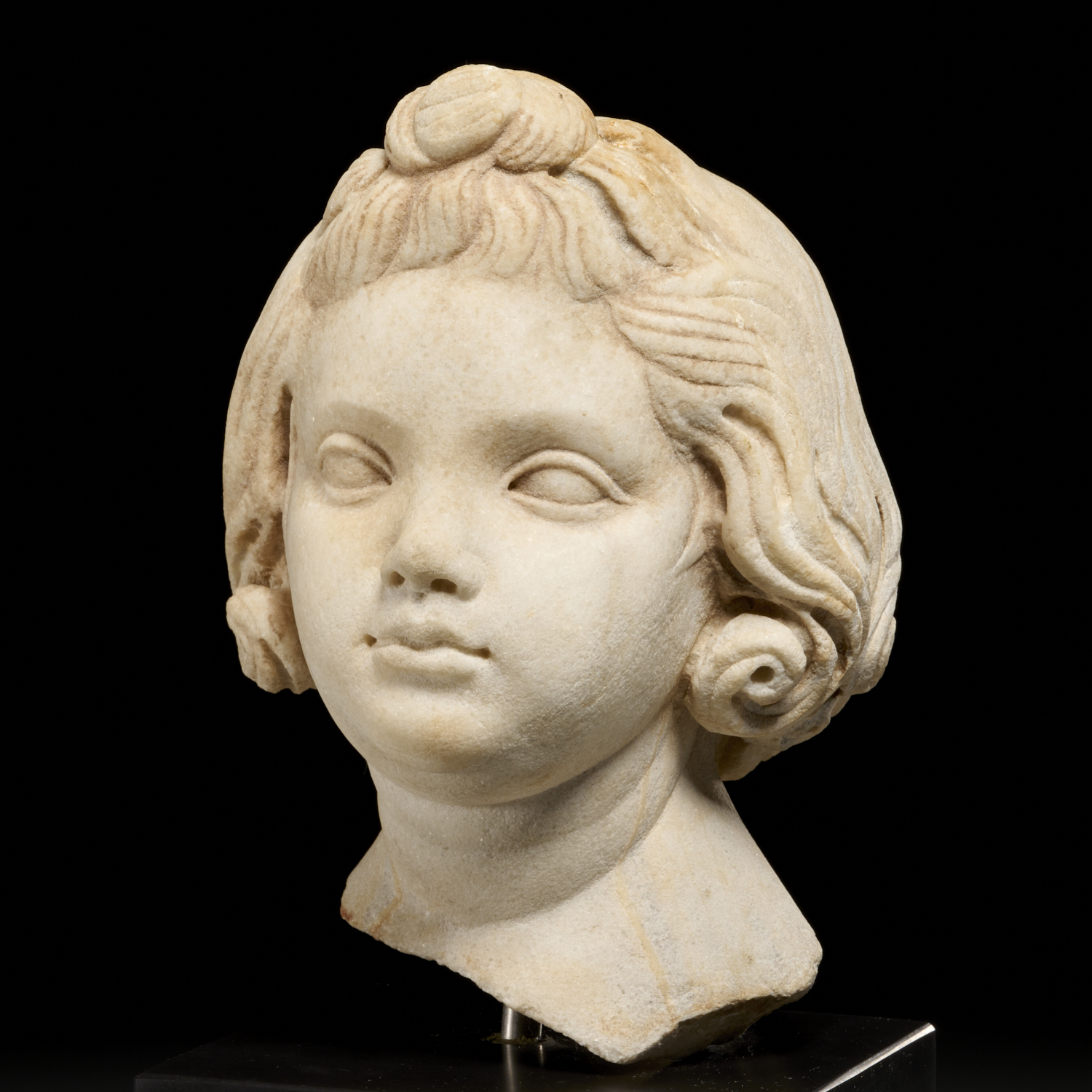 ROMAN MARBLE HEAD OF A CHILD c. 1st-2nd