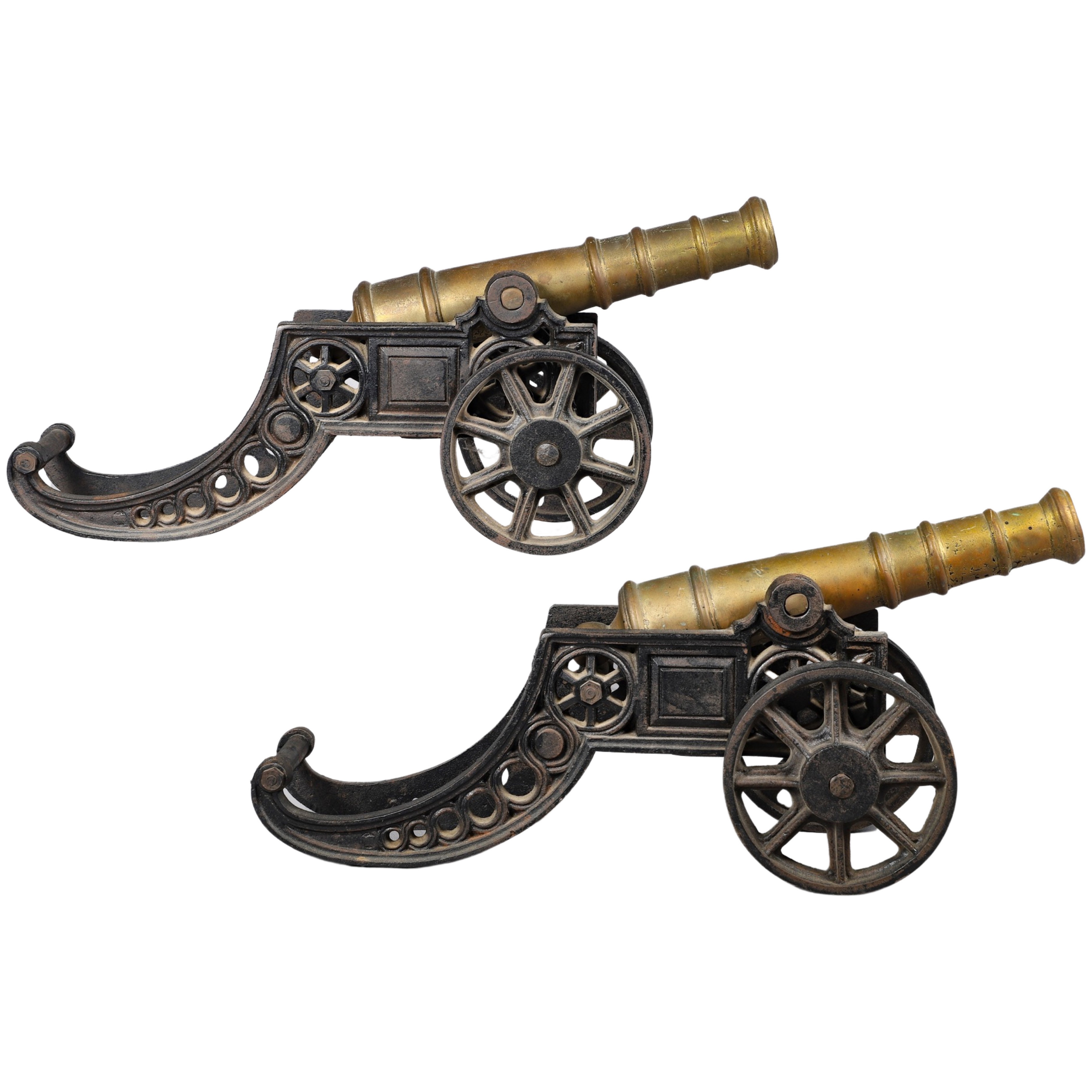 Cast iron and brass cannon pair,