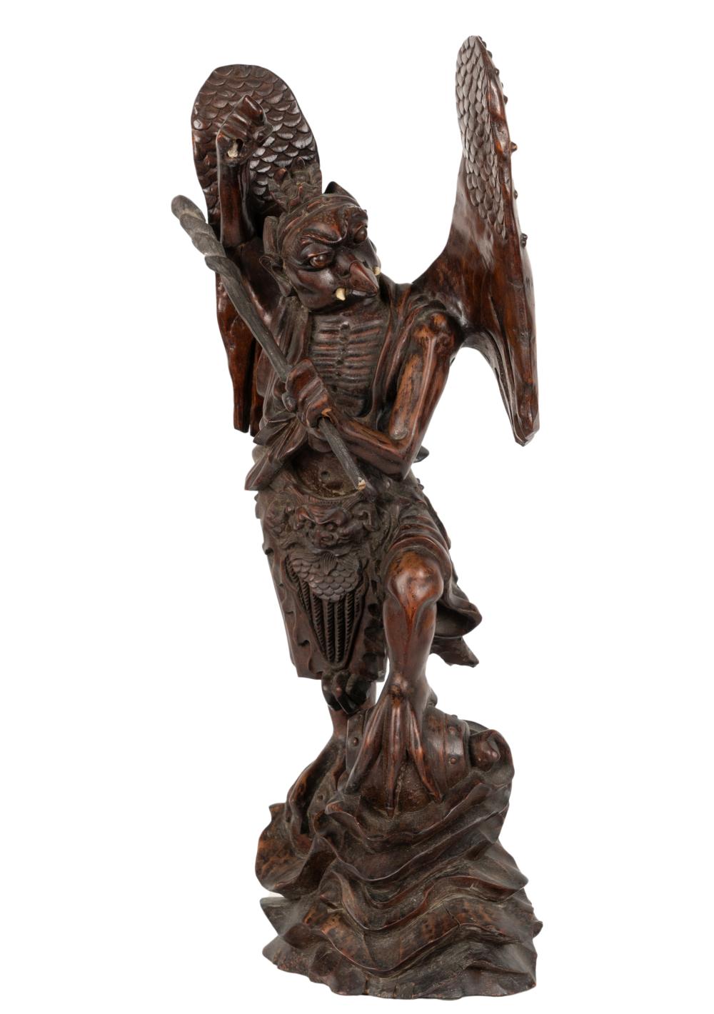 ASIAN CARVED WOOD FIGUREAsian Carved