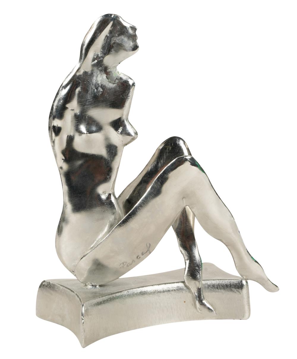 METAL FIGURE OF A SEATED WOMANMetal 3b5243