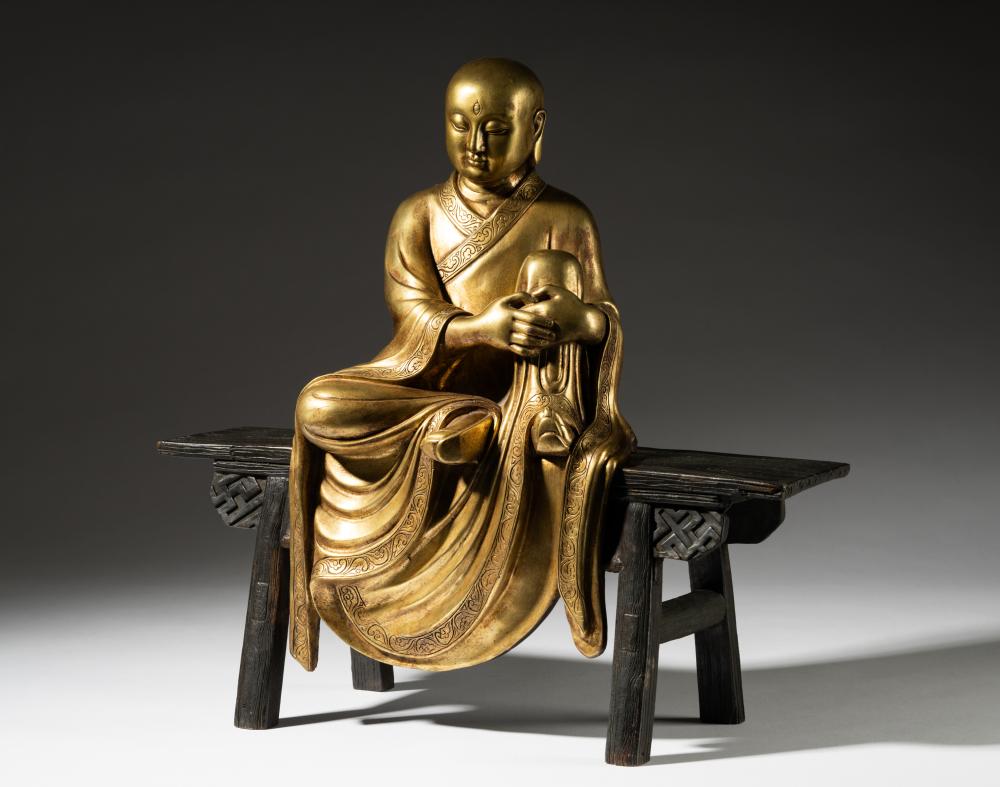 JAPANESE FIGURE OF A MAN SEATED