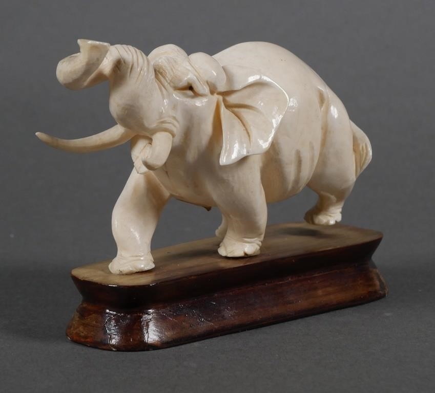 CARVED IVORY ELEPHANT FIGURECarved