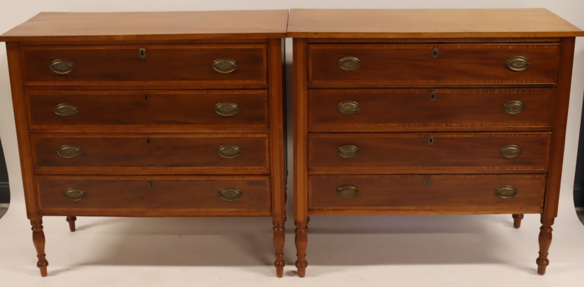 A PAIR OF MAHOGANY SHERATON DRESSERS.