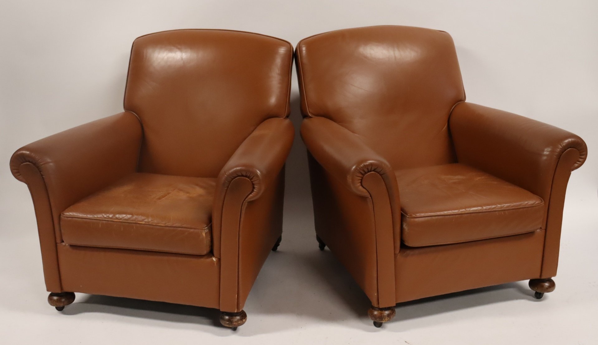 A VINTAGE PAIR OF BROWN LEATHER