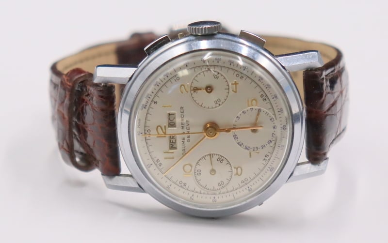 JEWELRY. VINTAGE BAUME & MERCIER TRIPLE