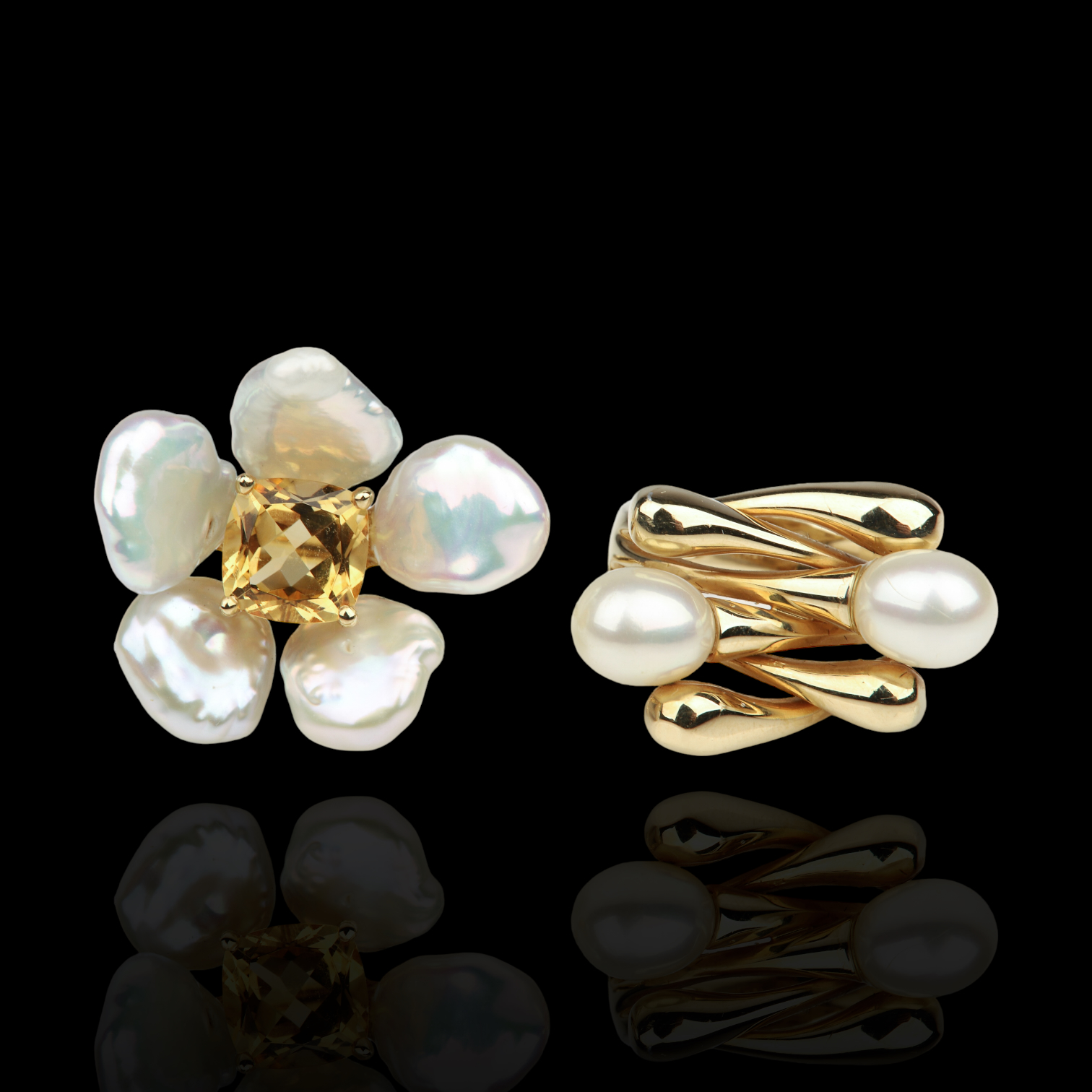 (2) 14K yellow gold and pearl rings