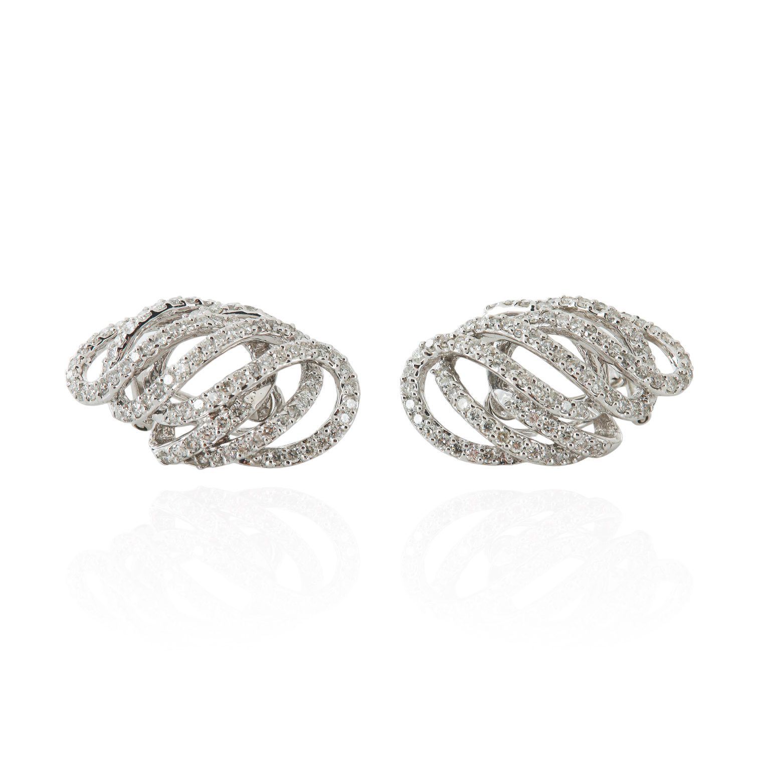 14K White gold diamond swirl earrings,