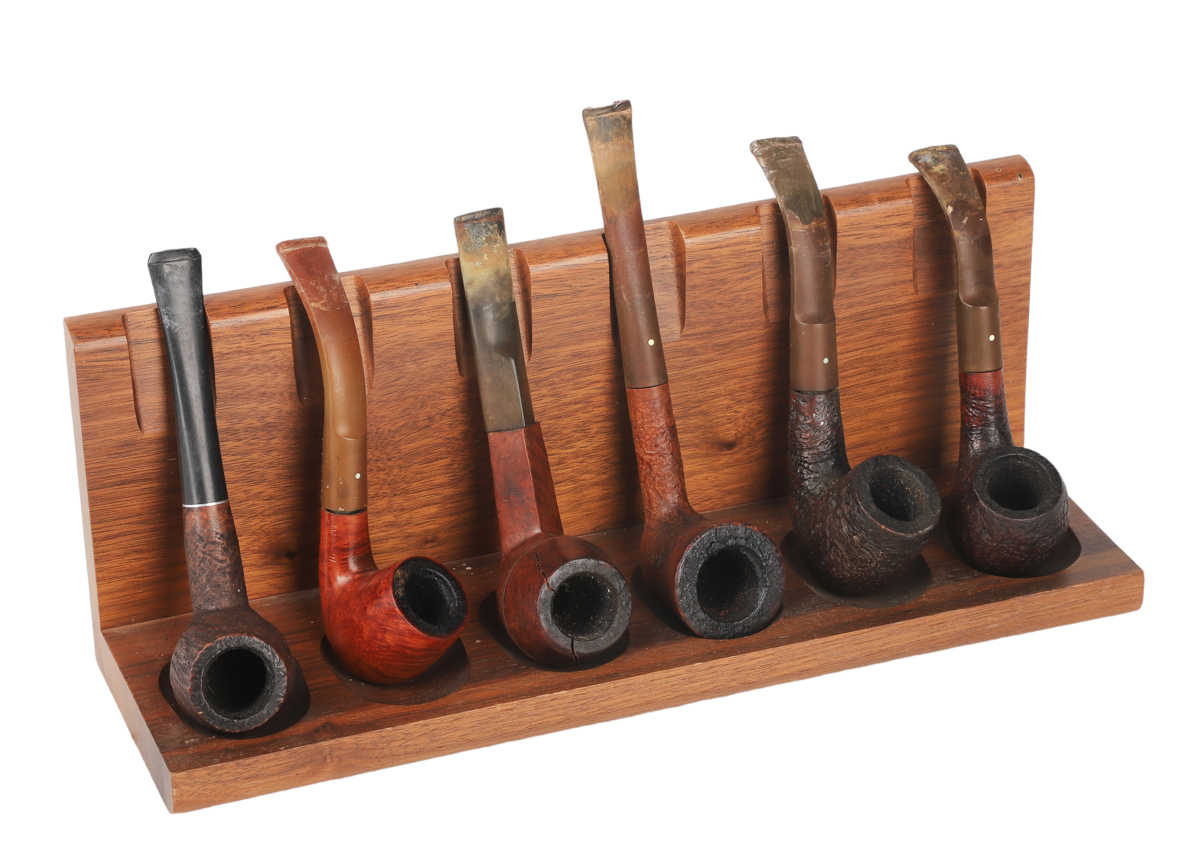 (6) Smoking tobacco pipes, including