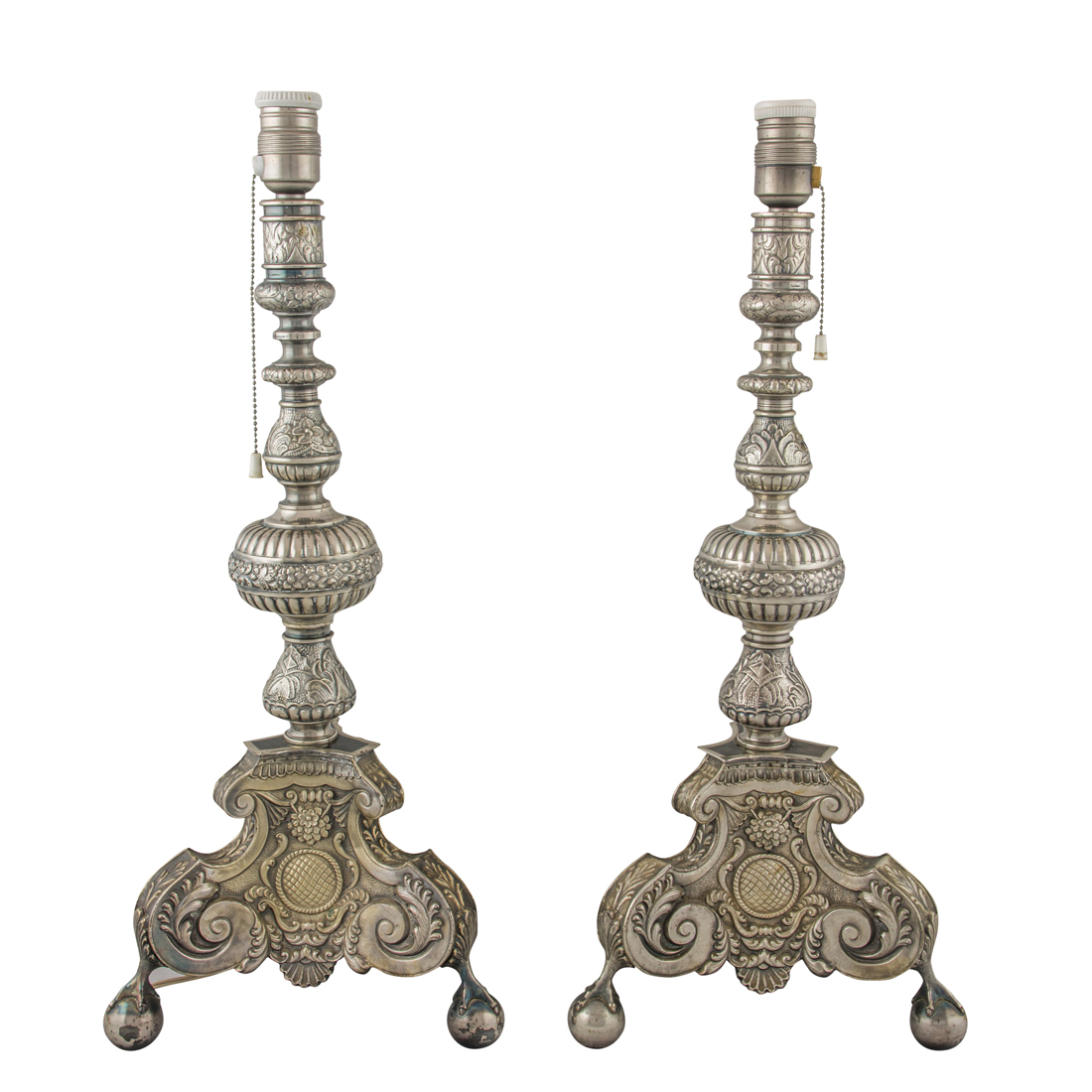 A PAIR OF SPANISH SILVER PRICKET