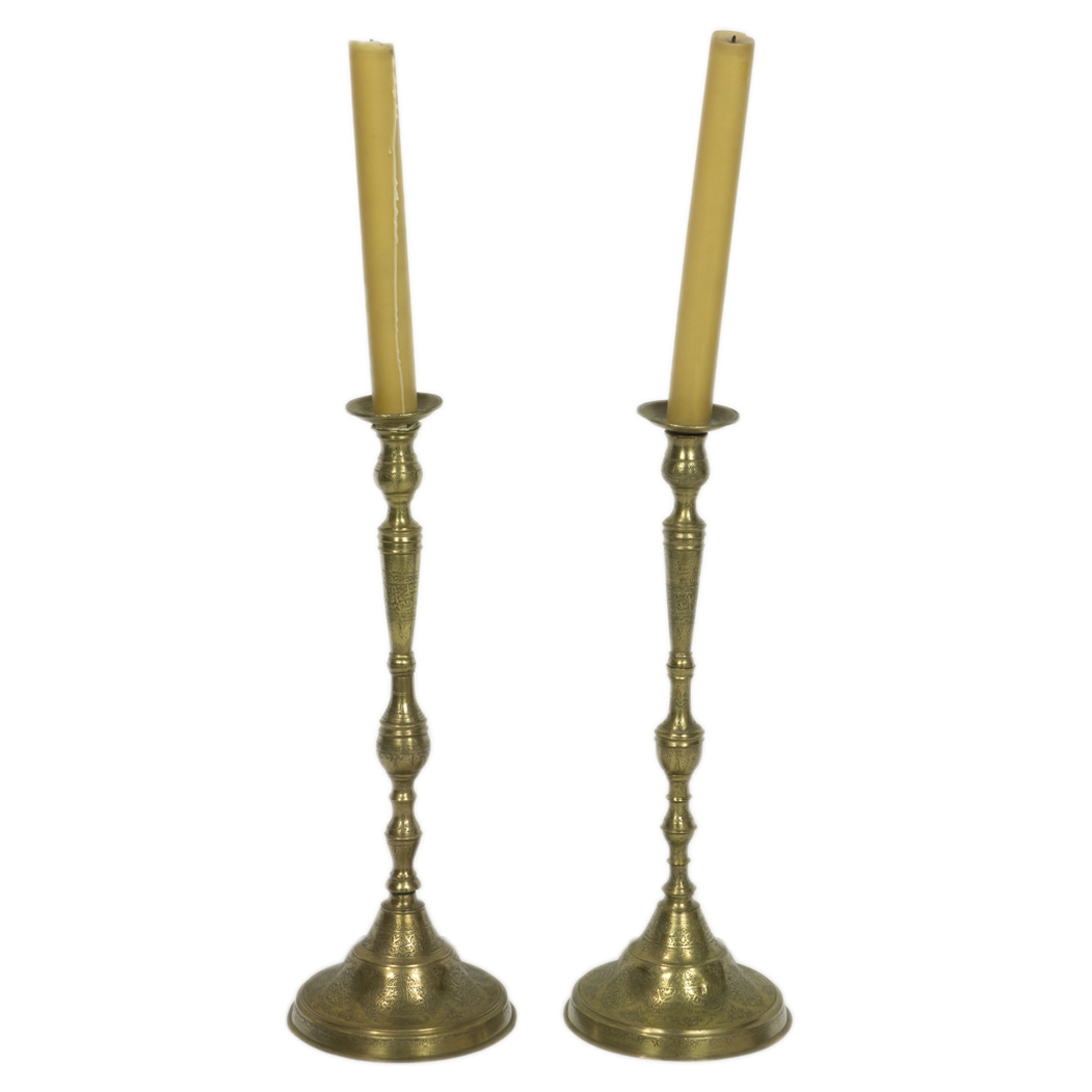 A PAIR OF PERSIAN BRASS CANDLE