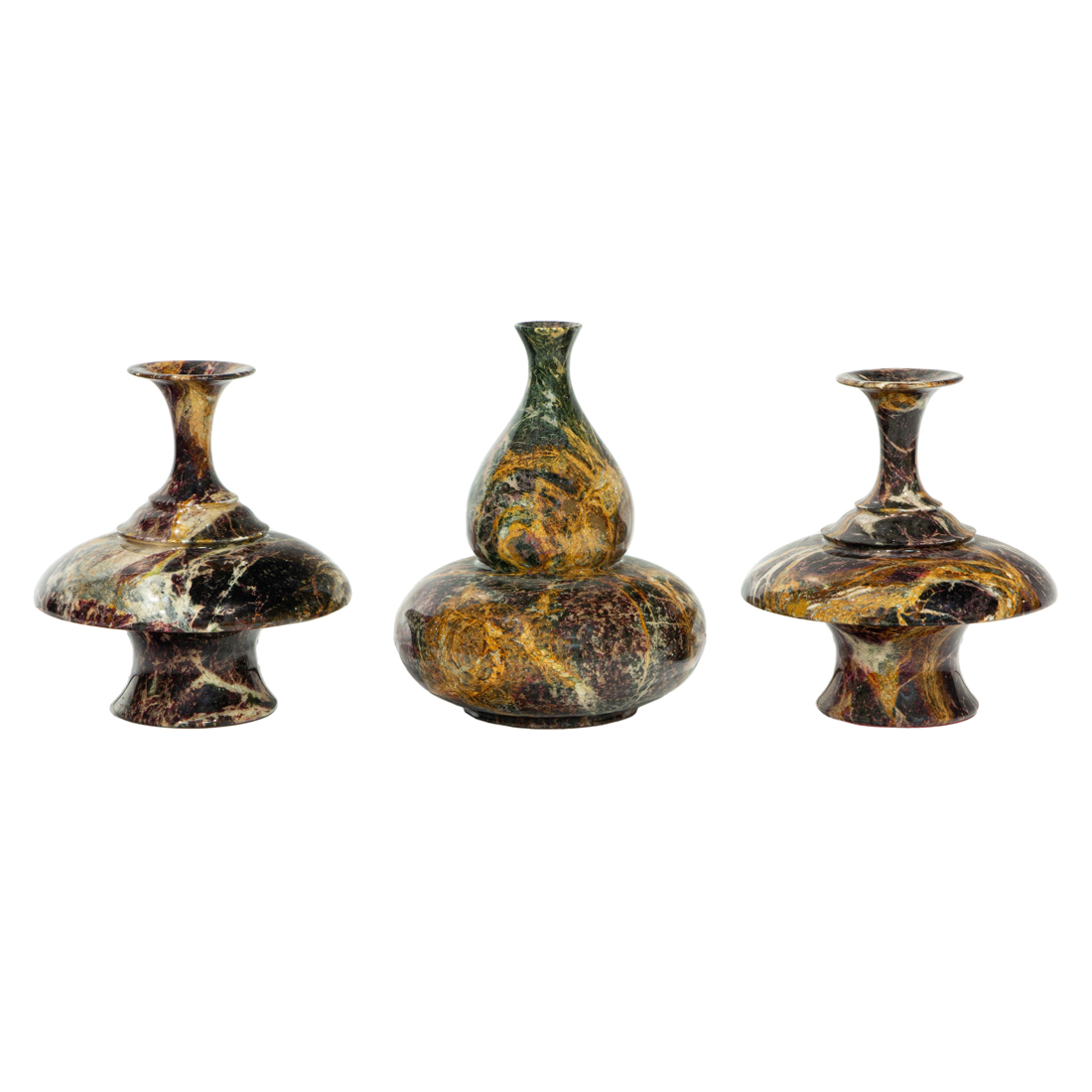 THREE CARVED AND POLISHED VARIEGATED