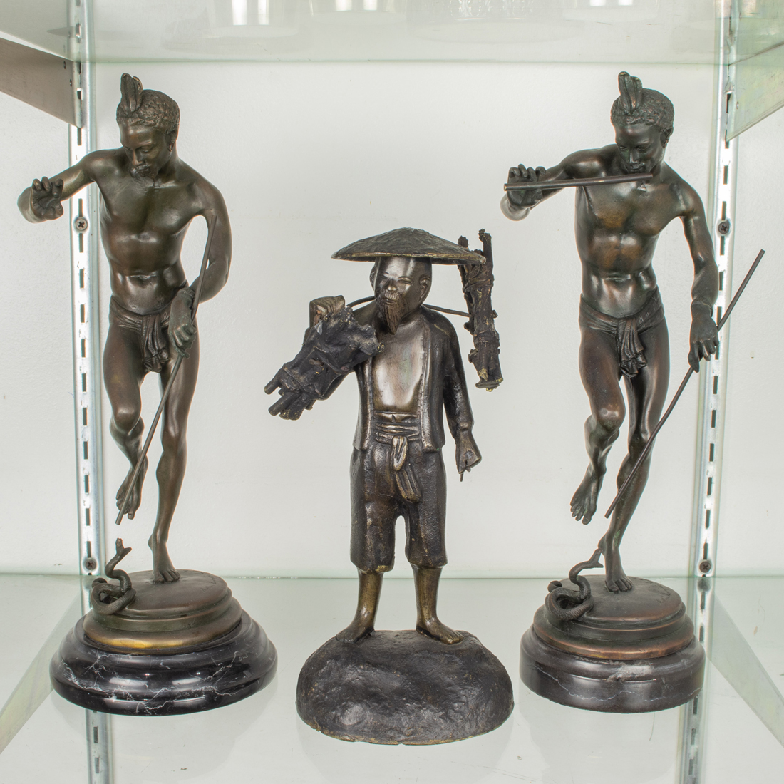 A GROUP OF THREE PATINATED BRONZE 3b4226