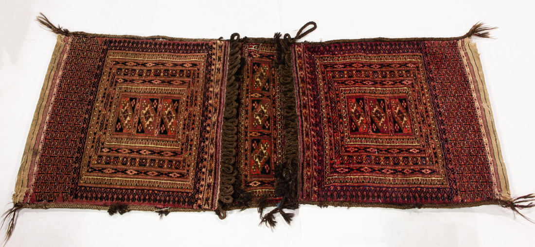 AN AFGHAN BOKHARA DOUBLE SADDLE