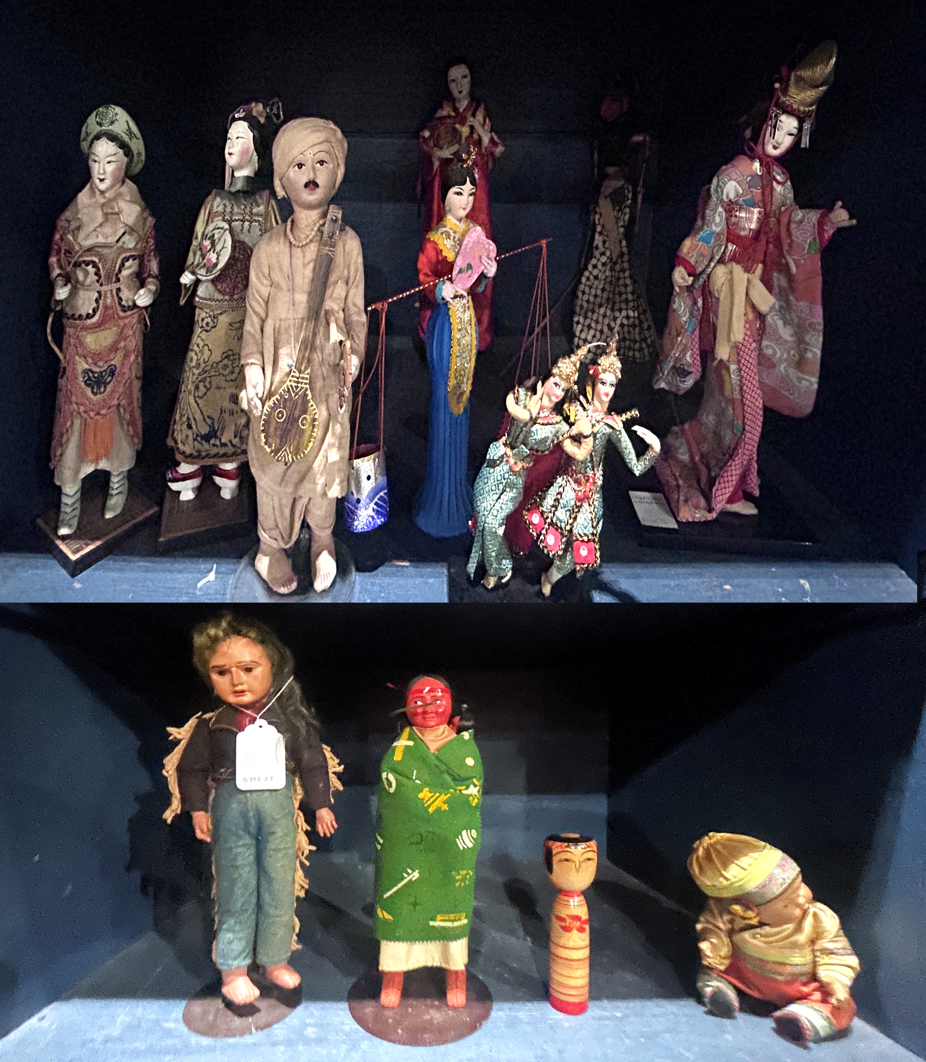 A GROUP OF APPROXIMATELY TWELVE DOLLS