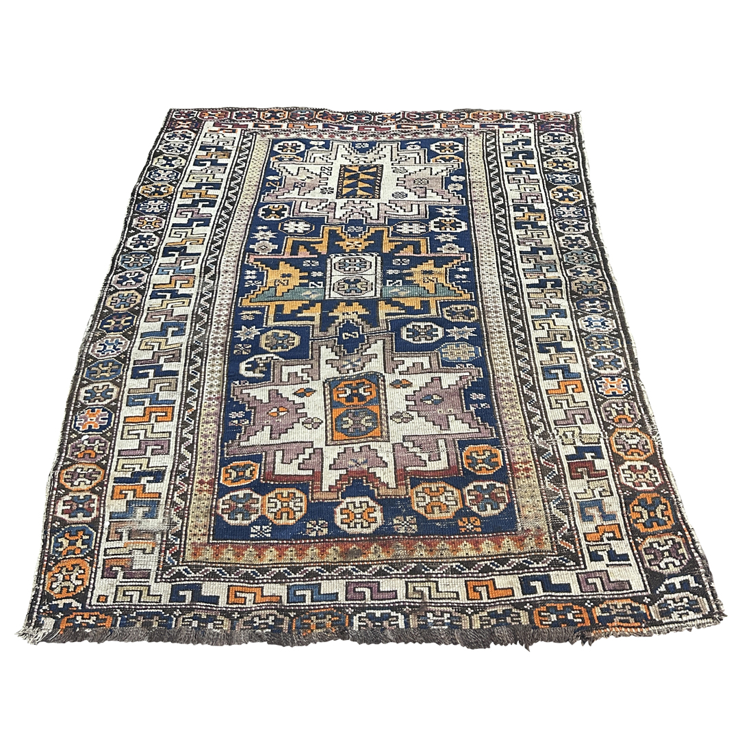 A CAUCASIAN CARPET A Caucasian carpet,