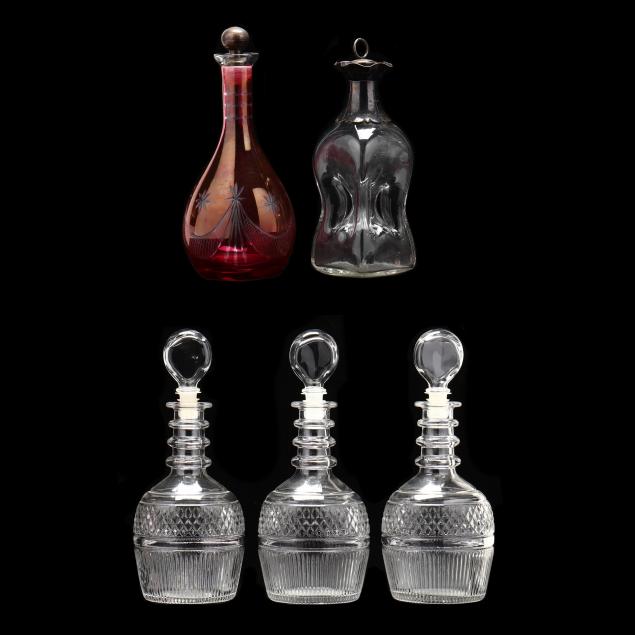 A GROUP OF FIVE DECANTERS Including