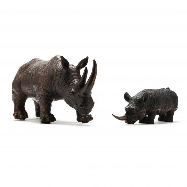 TWO SCULPTURES OF A RHINOCEROS,