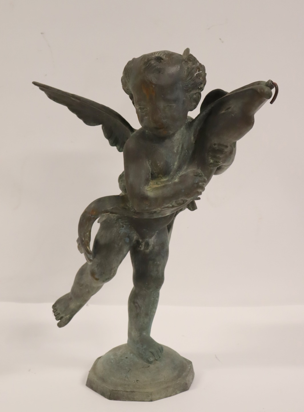 ANTIQUE WINGED CHERUB FORM FOUNTAIN.