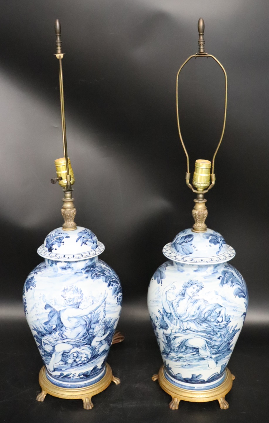 A PAIR OF BLUE & WHITE VASES MOUNTED