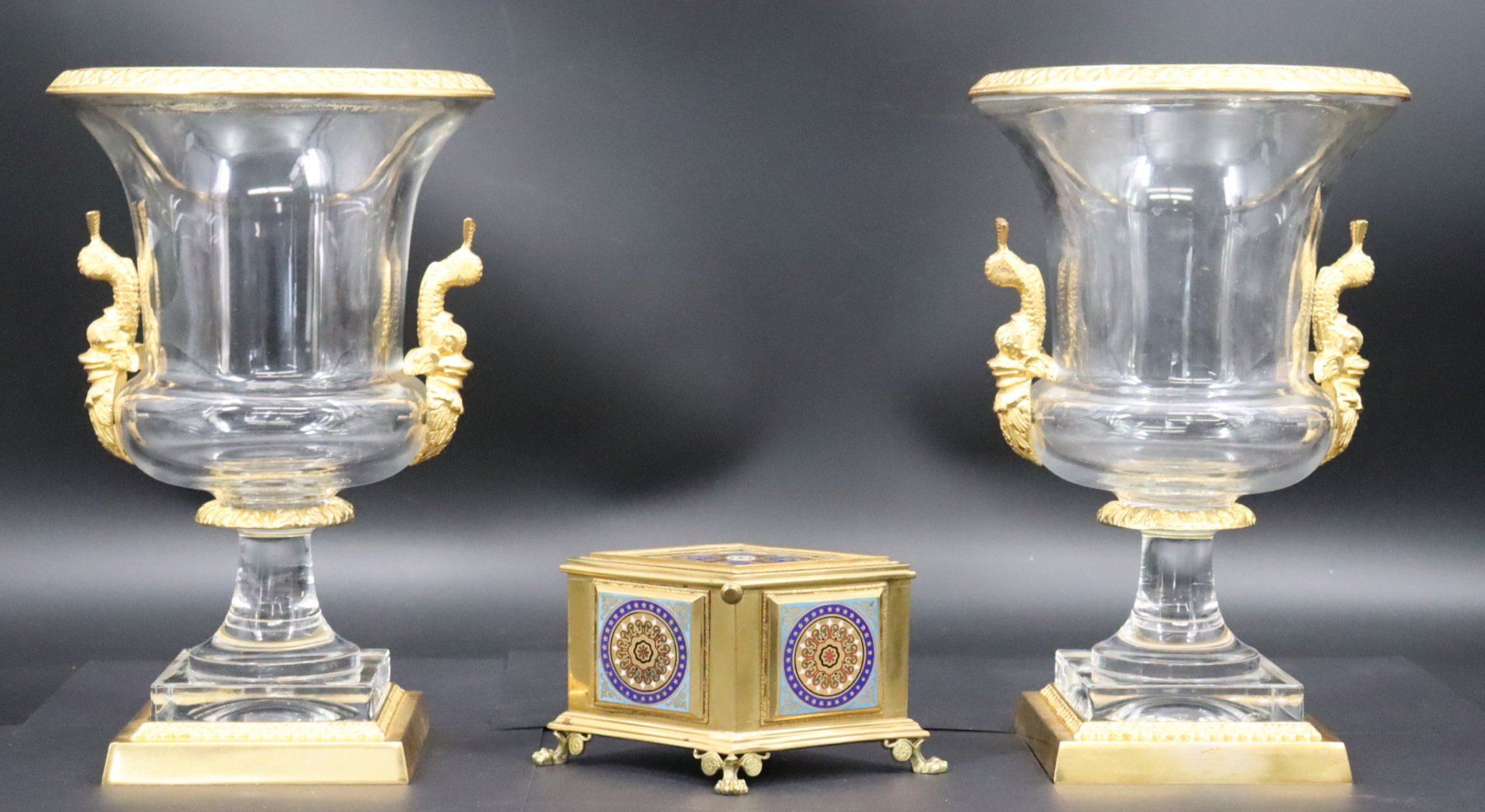 A PAIR OF GILT BRONZE & GLASS URNS