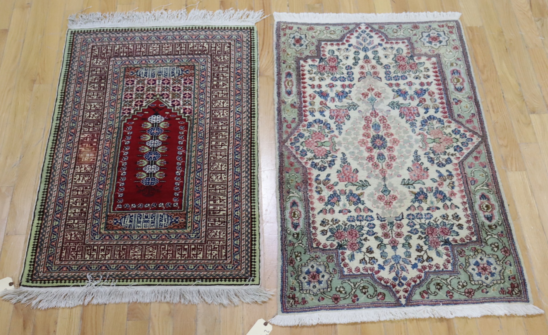 2 VINTAGE HAND KNOTTED AREA CARPETS.