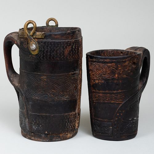 TWO ETHNOGRAPHIC CARVED WOOD WATER