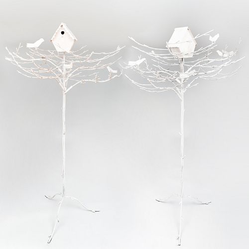 PAIR OF PAINTED METAL TREES SURMOUNTED