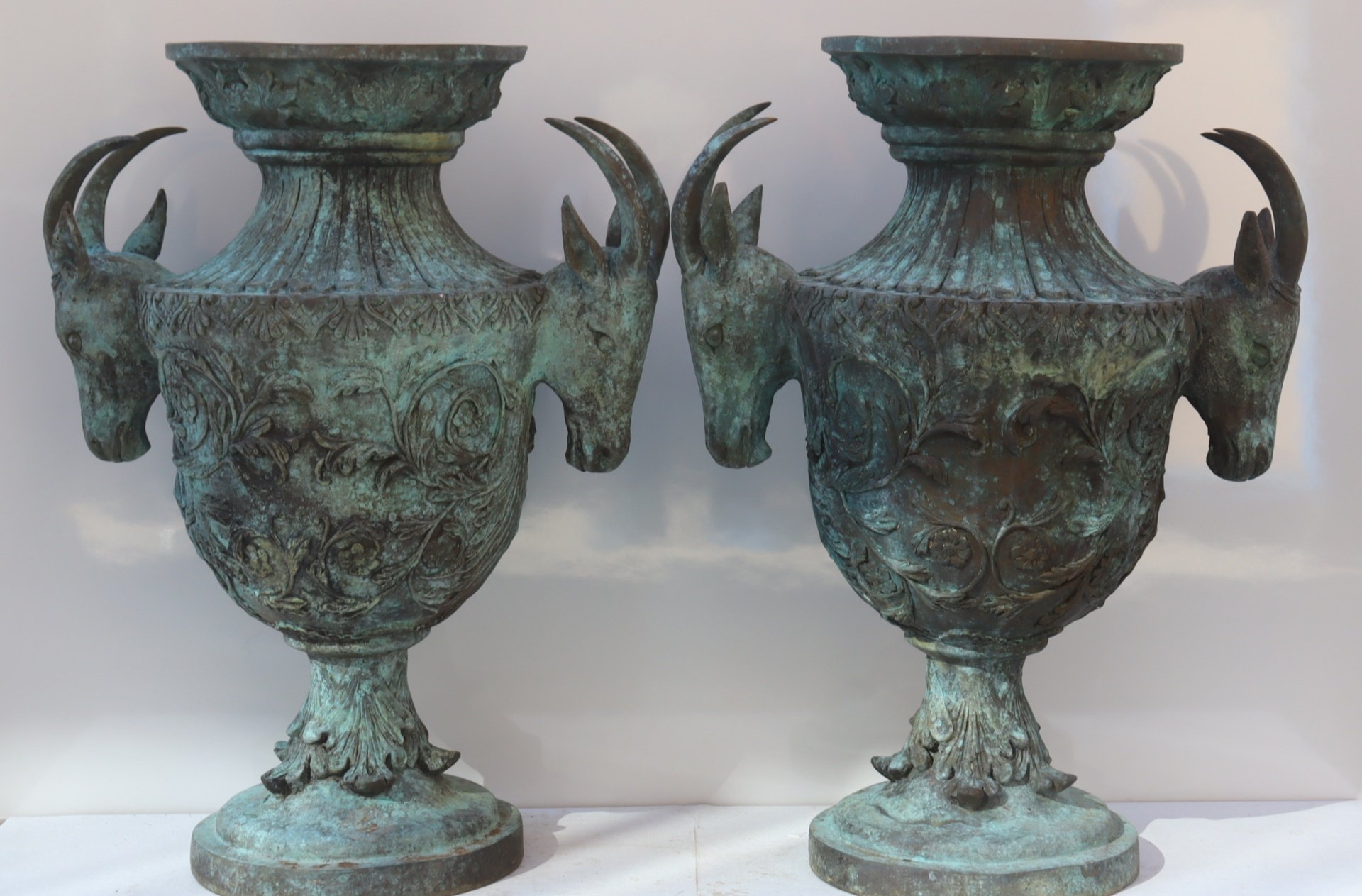 A VINTAGE PAIR OF VERDIGRIS BRONZE